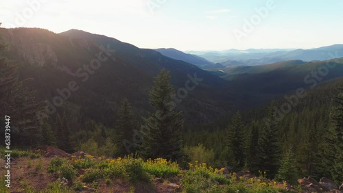 Cinematic aerial drone morning sunrise wildflowers Denver Mount Evans 14er Chicago lakes front range foothills Rocky Mountains  Idaho Springs Evergreen Squaw pass Echo Mountain lake trees slider right photo