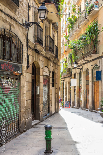 Photography Typical narrow street in the Gothic quarter of Barcelona, Spain