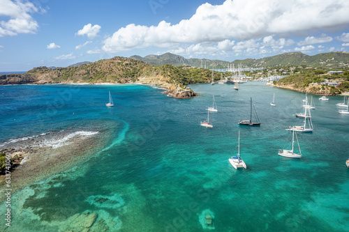 The drone aerial view of Fort Berkeley, English harbor and Nelson's dockyard national park in Antigua Island.  photo