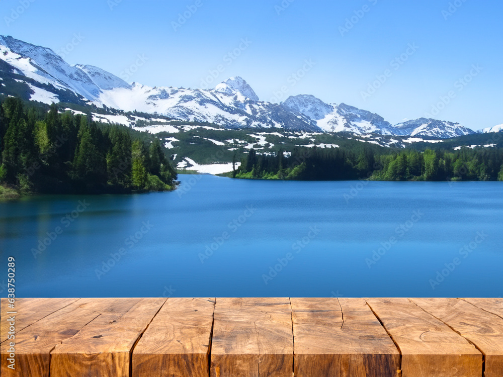 Wooden decking or flooring on beautiful landscape snow mountain and lake Wooden decking or flooring on beautiful landscape snow mountain and lake