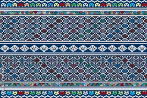 Ethnic fabric pattern, dark blue background.