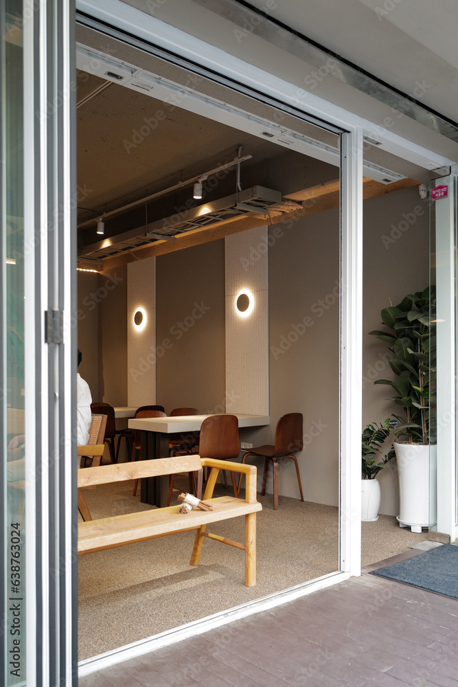 Obraz premium Interior design and decoration of coffee cafe decorated with wooden furniture