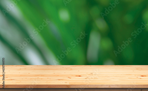 Empty wooden tabletop on blurred outdoor greenery background  suitable for product mockup display presentation