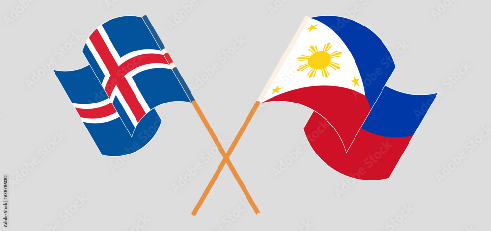 Crossed and waving flags of Iceland and the Philippines