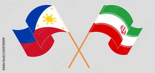 Crossed and waving flags of the Philippines and Iran
