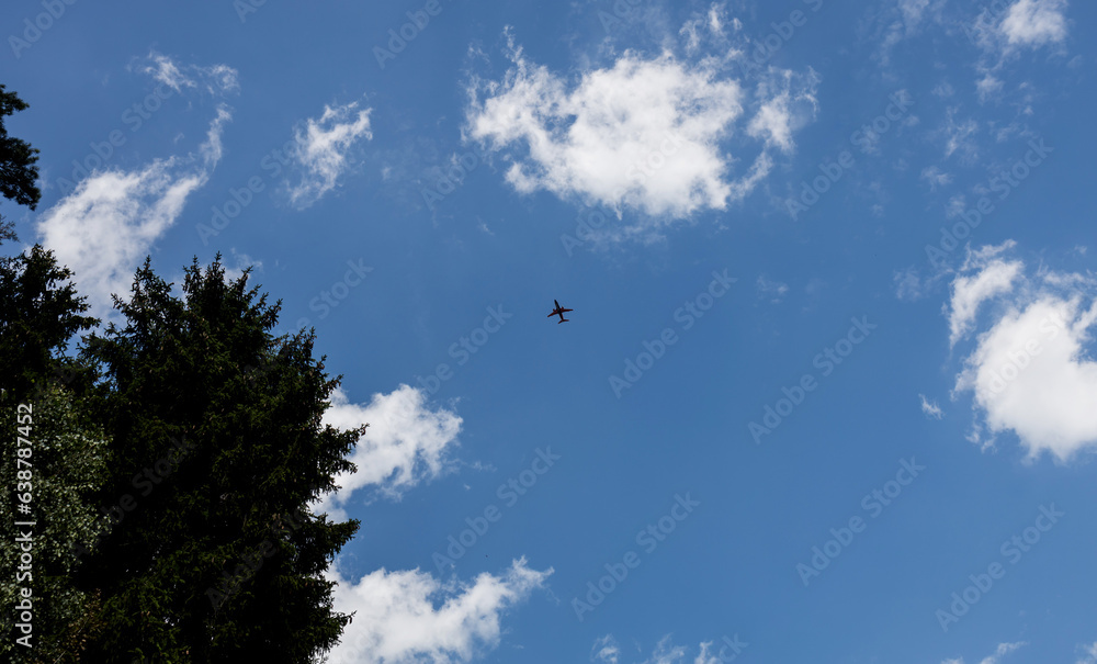jet plane flying in blue sky