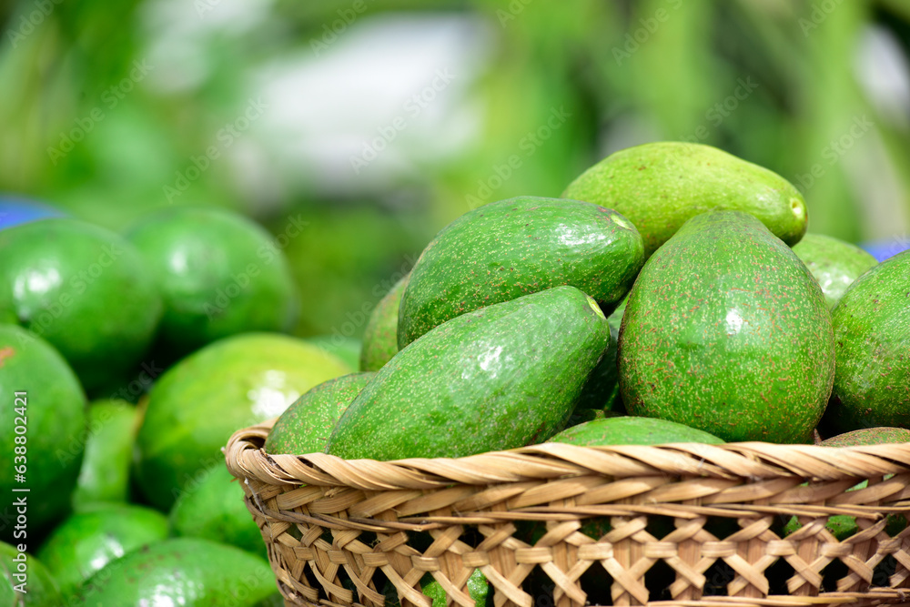 Fresh organic avocados, copy space. avocados are very nutritious and contain a wide variety of nutrients. Fresh organic avocados, copy space. avocados are very nutritious and contain a wide variety of nutrients.