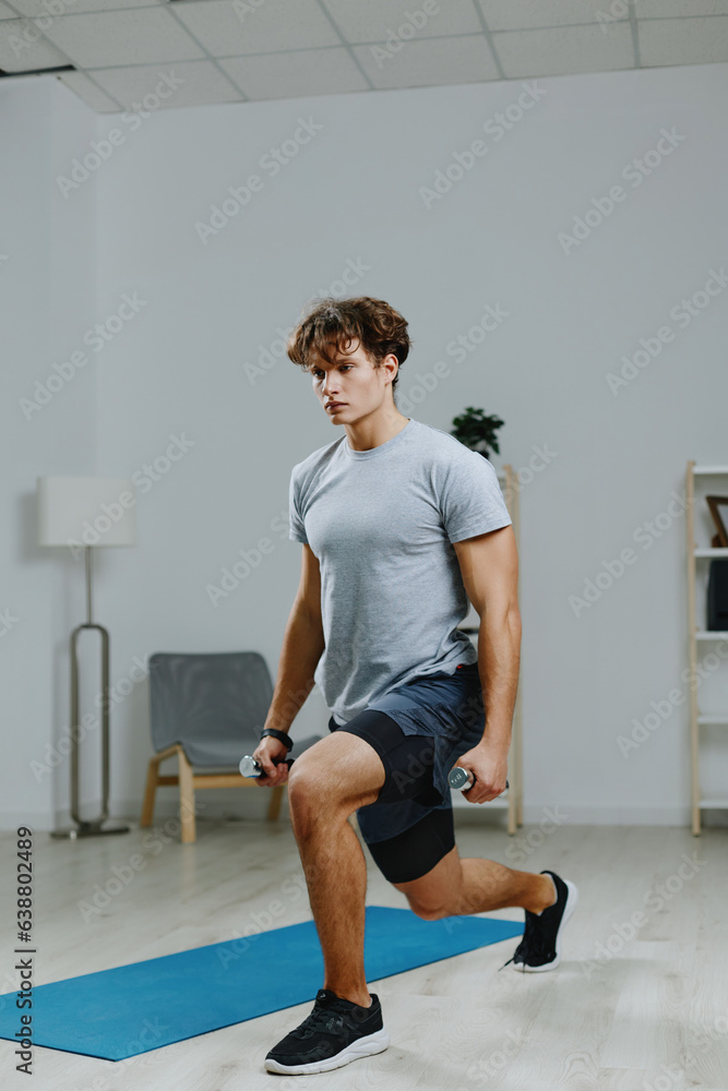Obraz premium home man gray dumbbells lifestyle indoor hobby sport training health activity