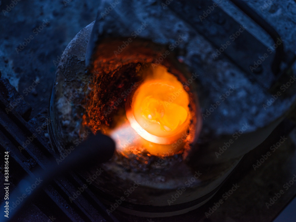 Process of melting metal in goldsmith workshop