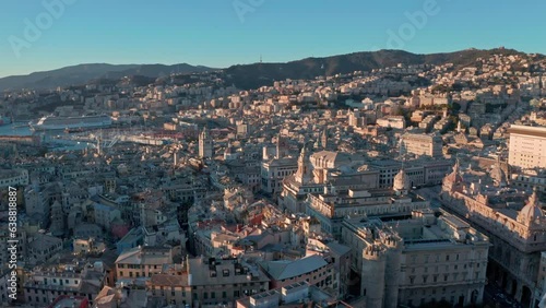 Aerial sunset riser view over historic buildings of port city Genova, Liguaria photo