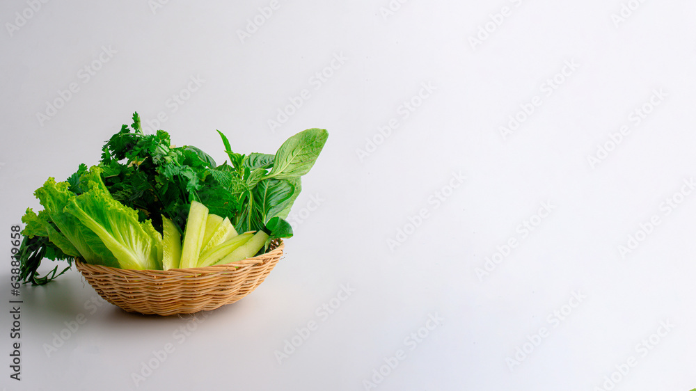 Fresh vegetable in a wooden basket on table. Fresh vegetable in a wooden basket on table.
