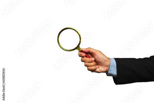 Businessman holding a magnifying glass while standing against a transparent background.