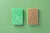 Natural cleaning scrub sponge on green background