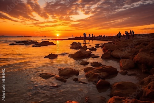 Stunning Sunset on Lake Shore with Silhouettes of Evening Fishermen © Nick Alias