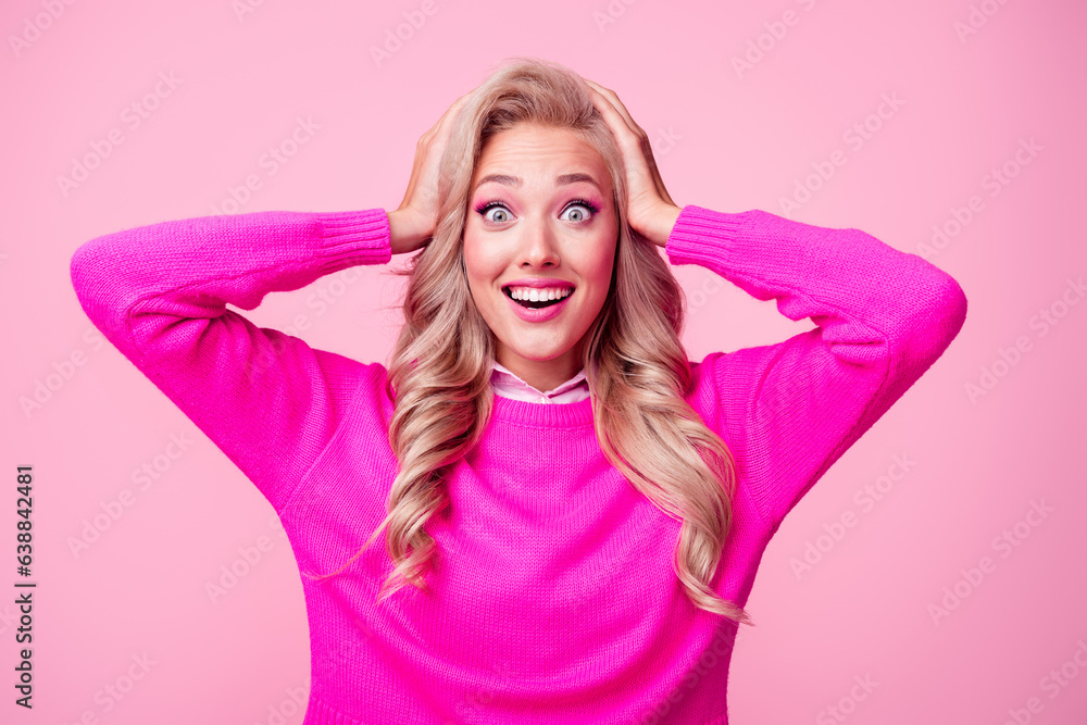 Photo of excited funky lady wear sweater smiling arms head open mouth isolated pink color background Photo of excited funky lady wear sweater smiling arms head open mouth isolated pink color background