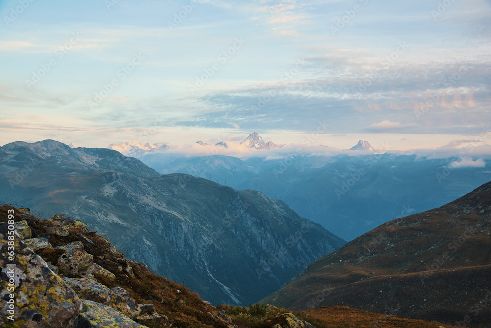 Fototapeta premium mountainous landscape with clouds in switzerland, swiss alps