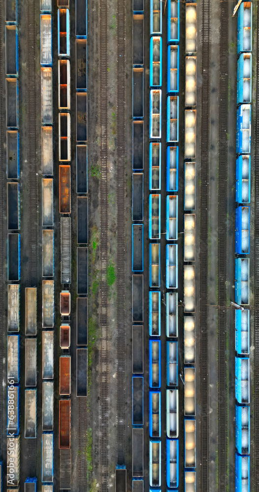 Drone view of freight trains. Colorful railway cargo wagons on railroad. Aerial view of colorful wagons. Depot of freight trains. Railway station. Transportation and Industry. Drone view of freight trains. Colorful railway cargo wagons on railroad. Aerial view of colorful wagons. Depot of freight trains. Railway station. Transportation and Industry.