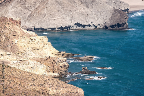 Panoramic view of cliffs and beaches in the Gata Cape Natural Park coast near San José. Almería, Andalucía, Spain.