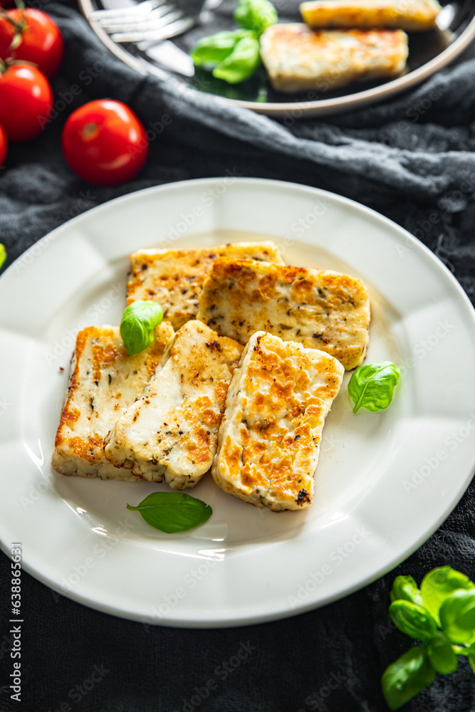 halloumi fried cheese fresh basil meal food snack on the table copy space food background rustic top view halloumi fried cheese fresh basil meal food snack on the table copy space food background rustic top view