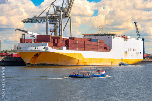 Car carrier in the Port of Hamburg, These roro vessels are cargo ships specially fitted for the transport of large quantities of cars  photo