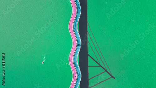 Minimal drone photo of a funky looking bridge