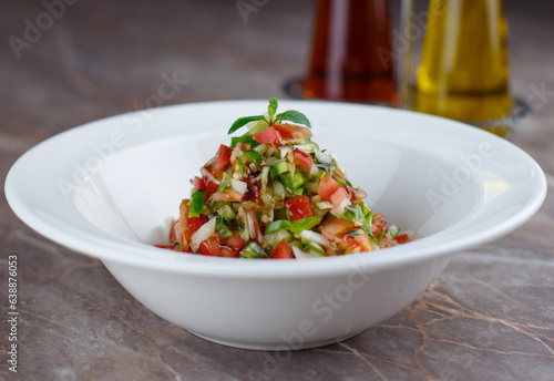 Fresh finely chopped shepherd salad on a bowl