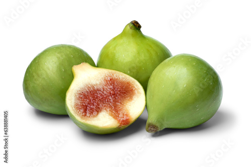 Heap of fresh whole and halved green figs isolated on white background close up