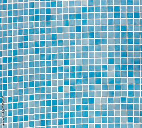 Small blue tile tiles on the wall. Texture