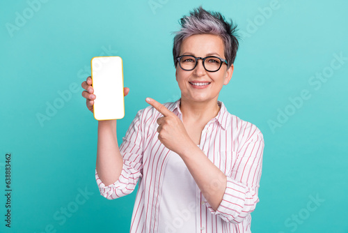 Photo portrait of cheerful young grey hair woman phone direct finger screen menu app qr code scan isolated on cyan color background