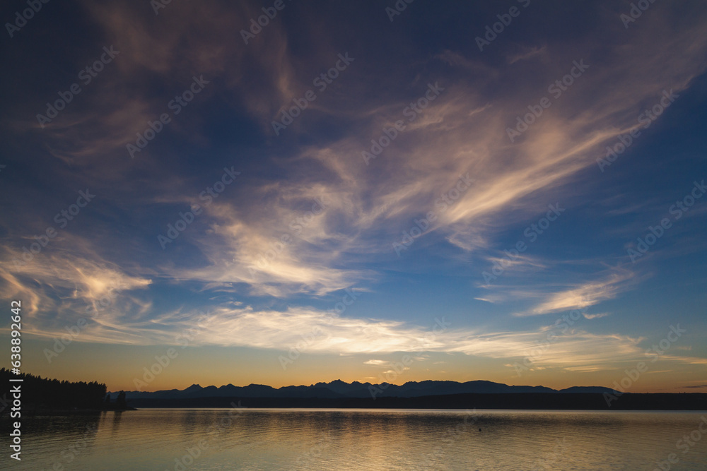 Tranquil Dawn: Reflection on Calm Lake