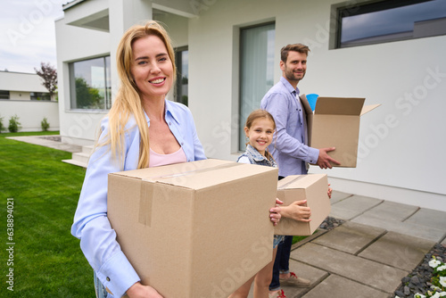 Married couple with a daughter moves into new modern house