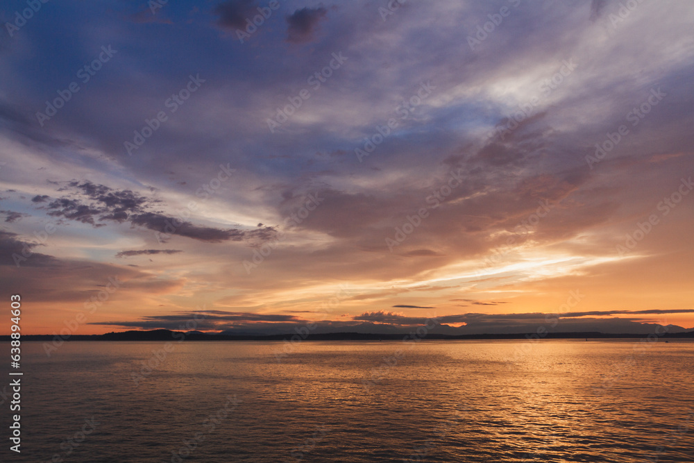 Serene Sunset Reflection on the Ocean Horizon