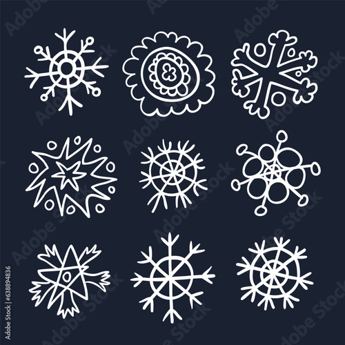 Snowflakes drawn in childish style linear icons set on black (ID: 638894836)
