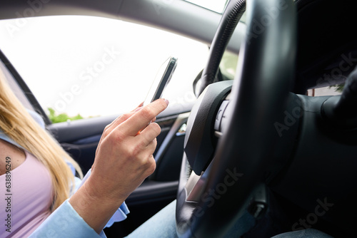 Wallpaper Mural Young woman sits at the wheel of a modern car Torontodigital.ca