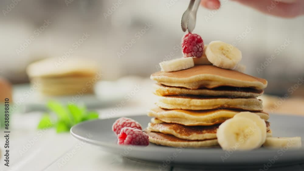 Sweet, pregnant worker confidently cooking American pancakes at home kitchen. Close up young parent cooking pancakes for breakfast use new morning breakfast recipe, dessert Sweet, pregnant worker confidently cooking American pancakes at home kitchen. Close up young parent cooking pancakes for breakfast use new morning breakfast recipe, dessert