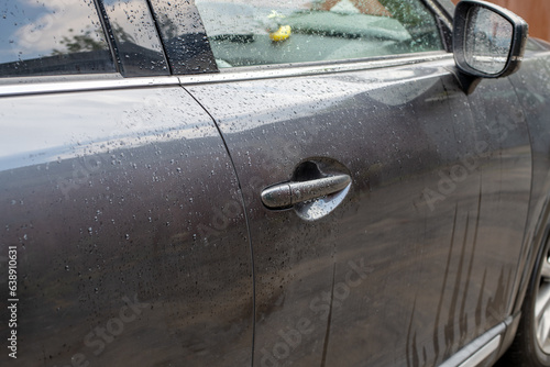 wet car door after rain or washing