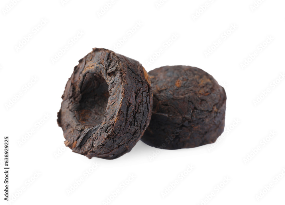Cake shaped traditional Chinese pu-erh tea isolated on white Cake shaped traditional Chinese pu-erh tea isolated on white