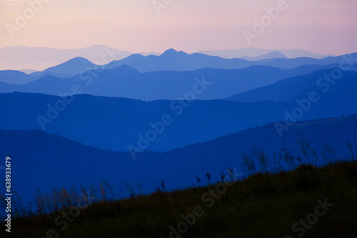 Amazing Carpathian mountains evening layers view near Dragobrat, Ukraine photo