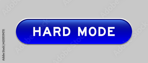 Blue color capsule shape button with word hard mode on gray background