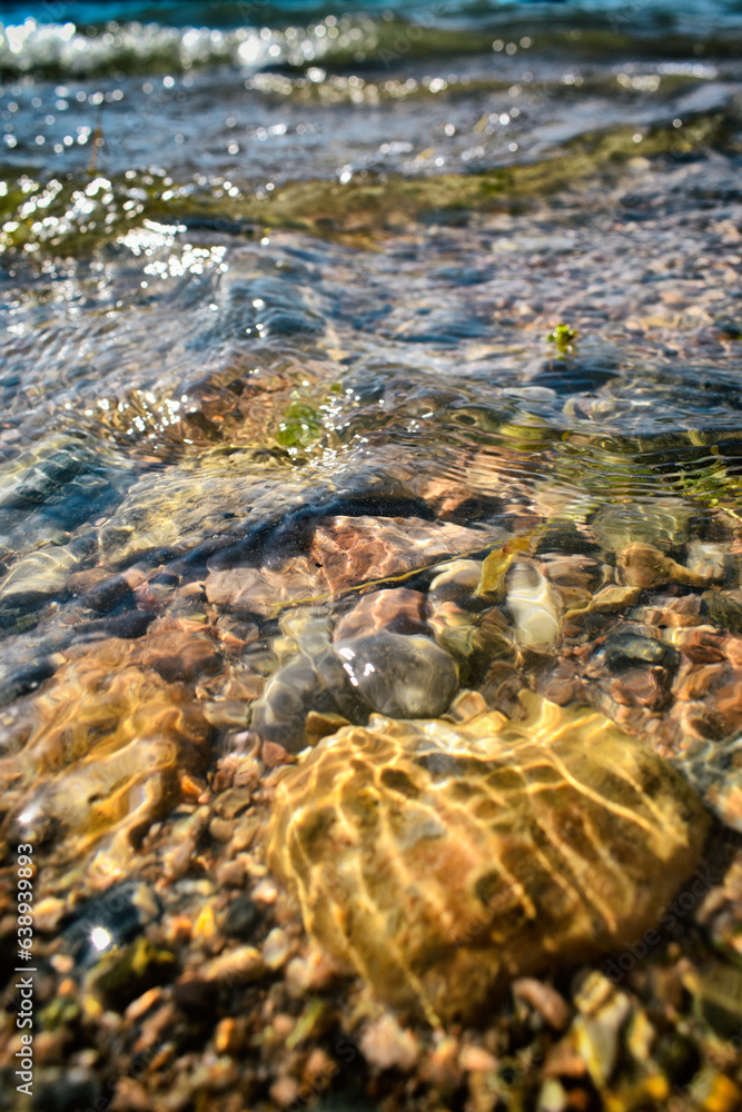 Water and rocks, Glare in the water, close-up