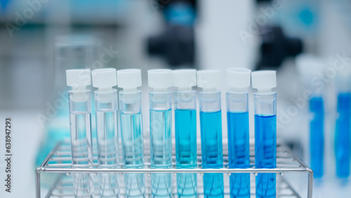 Laboratory glassware and test tubes scientific background, extensive research in science medicine, biology and biotechnology chemistry and scientific exploration. Liquid samples analyzed in test tubes