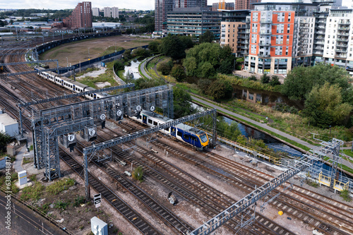 Canvas Print Aerial view of a local passenger train at a major railway junction