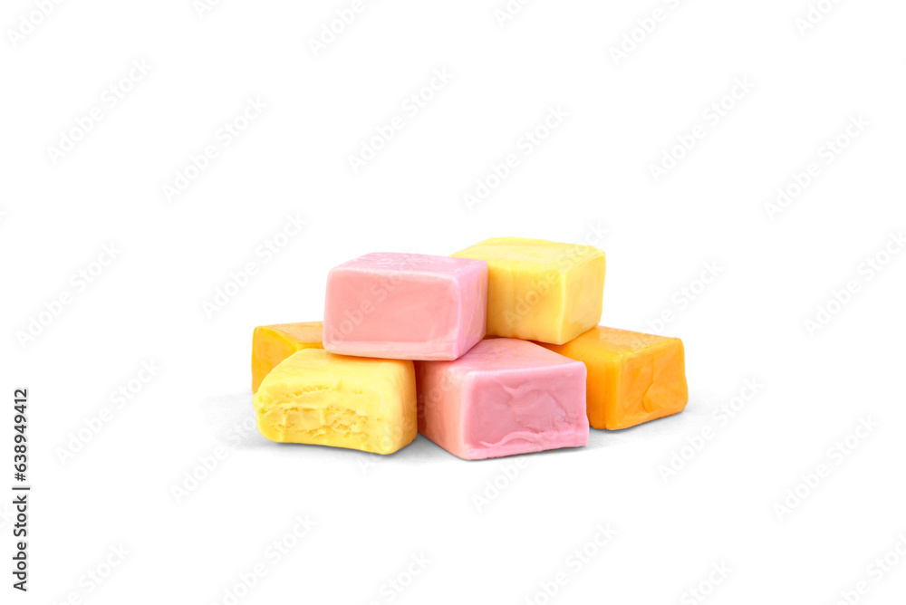 Pile of color square chewable candies isolated on white background. Pile of color square chewable candies isolated on white background.