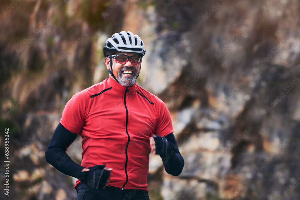 Cycling, mountain and excited mature man for exercise, training and workout goals in nature. Sports, travel and happy male cyclist with celebration for wellness, cardio and fitness for adventure