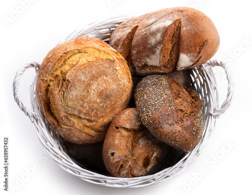 Basket with different kinds of bread Top view. Isolate on white background