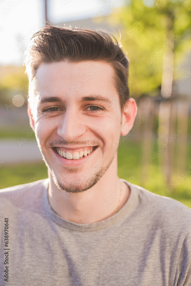 Portrait of young caucasian man serene and confident outdoors Portrait of young caucasian man serene and confident outdoors
