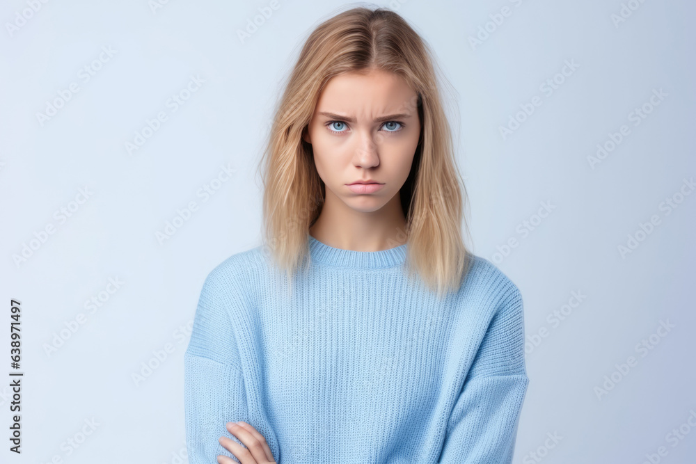 Sadness European Girl In Blue Sweater On White Background . Сoncept Sadness, European Girl, Blue Sweater, White Background Sadness European Girl In Blue Sweater On White Background . Сoncept Sadness, European Girl, Blue Sweater, White Background