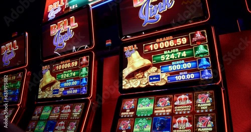 Slider shot of modern casino slot machines