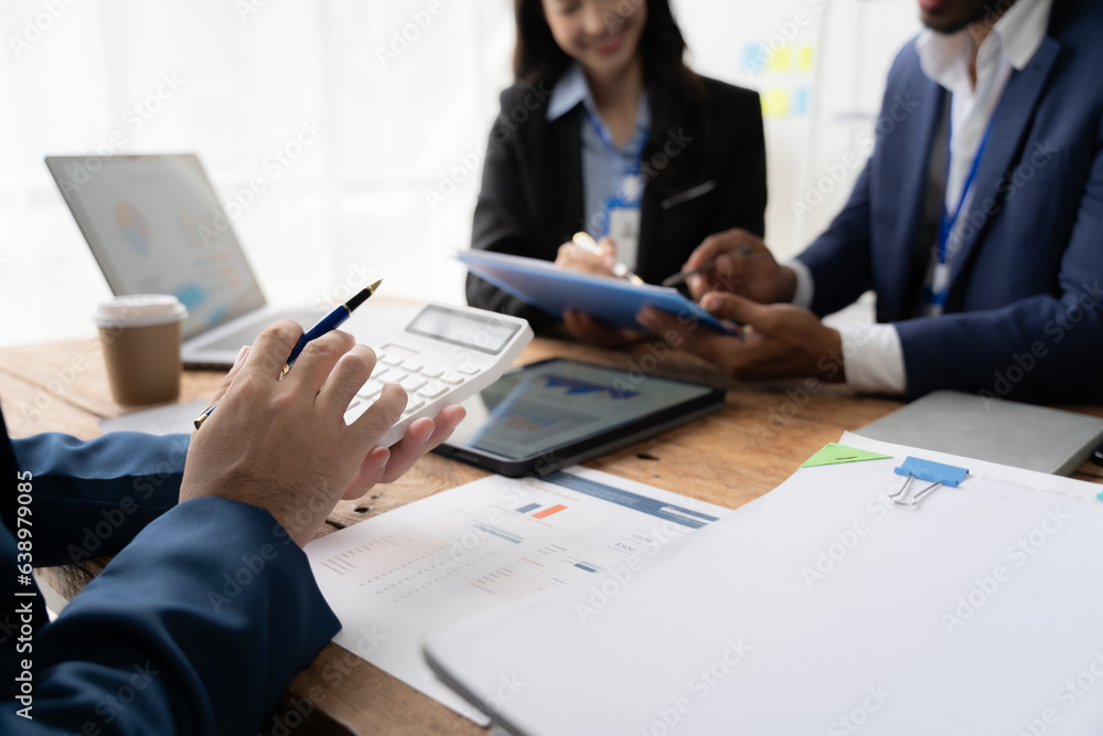 Young colleagues having great business conversations in a modern coworking office. Teamwork concept. Horizontal blurry background. Fireworks. Young colleagues having great business conversations in a modern coworking office. Teamwork concept. Horizontal blurry background. Fireworks.