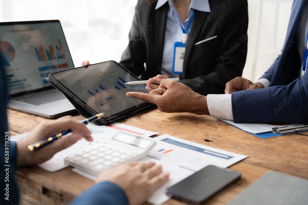 Young colleagues having great business conversations in a modern coworking office. Teamwork concept. Horizontal blurry background. Fireworks. Young colleagues having great business conversations in a modern coworking office. Teamwork concept. Horizontal blurry background. Fireworks.